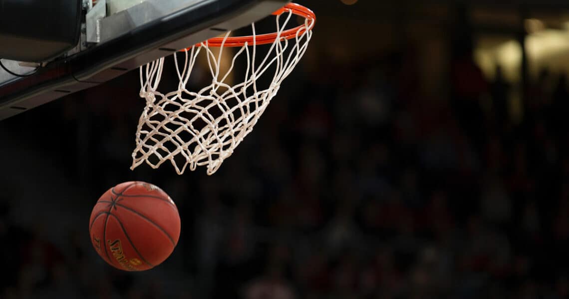 Basketball going through the net